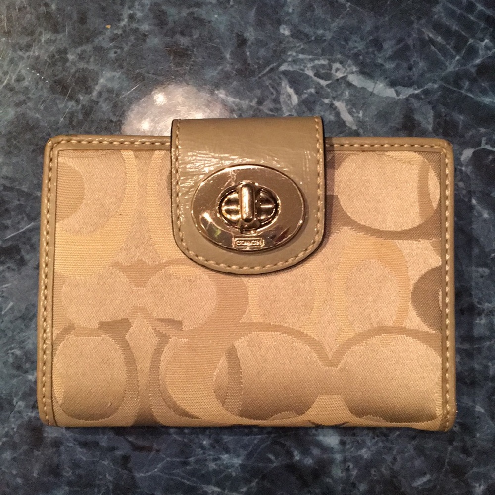 Gray Coach wallet with purple lining!